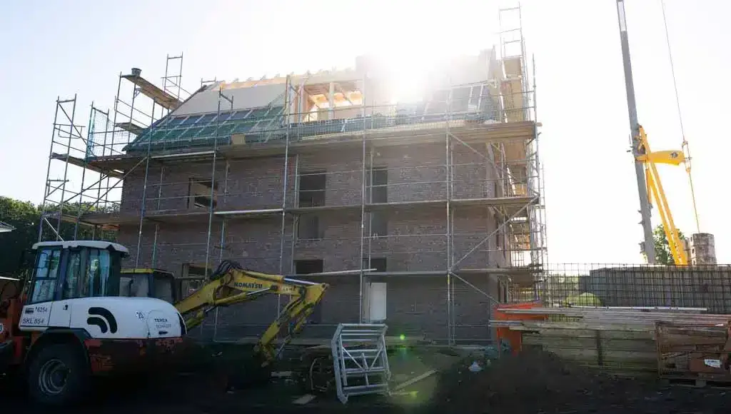 Oppenhome Immobilien - Neubau-Erdgeschosswohnung in Senden (Außenansicht)