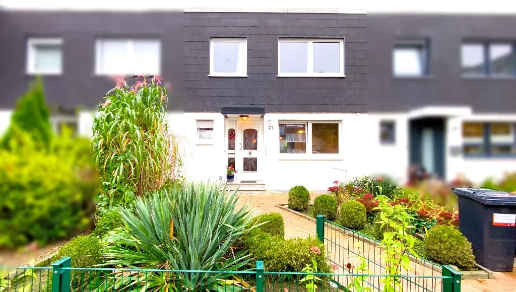Oppenhome Immobilien _ Ideale Ruamaufteilung in ruhiger, zentraler Lage (Aussenansicht vorne)